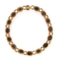 BLACK STAR SAPPHIRE, DIAMOND, AND YELLOW GOLD NECKLACE