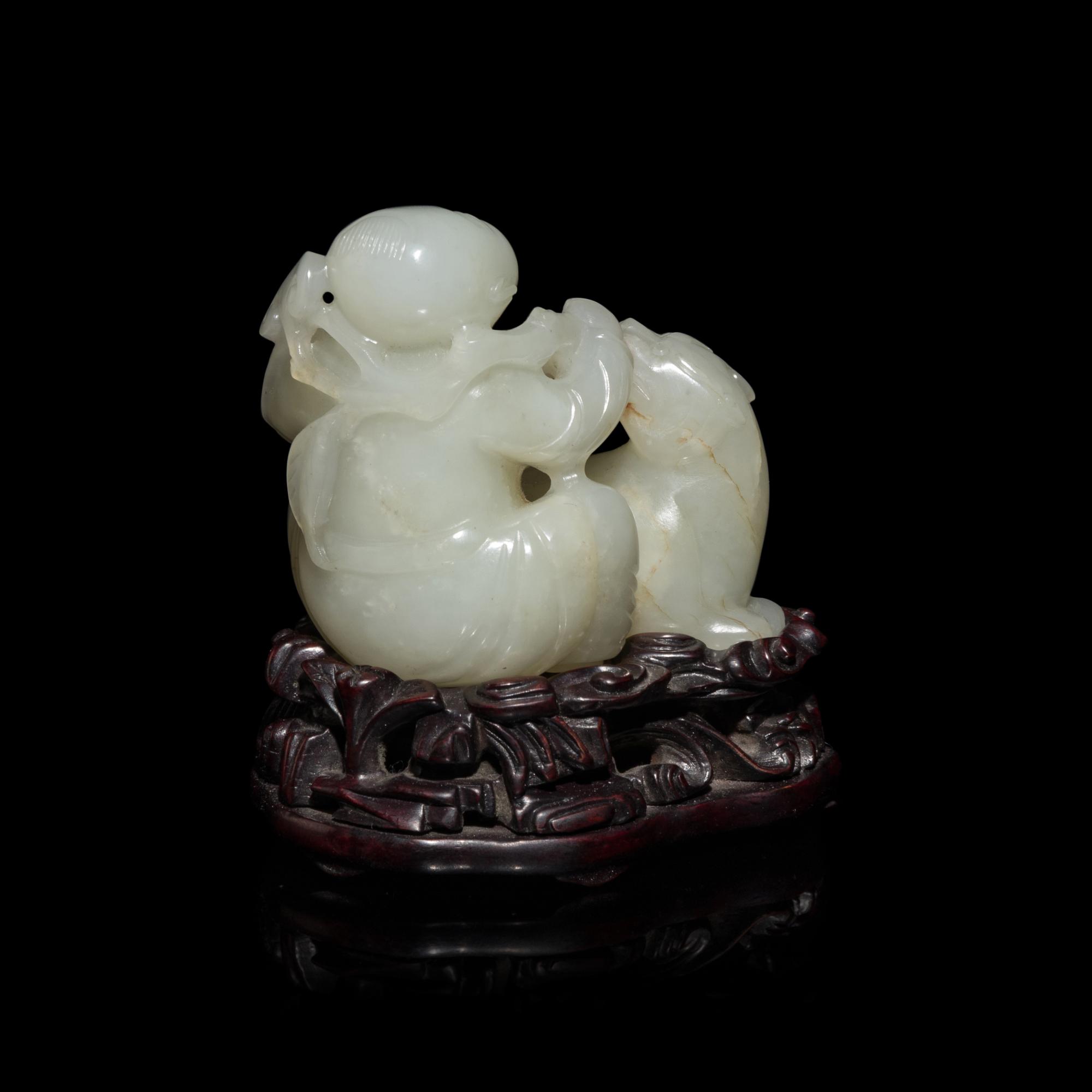 A Chinese White Jade Carving of Boy and Mythical Beast 白玉童子瑞獸把件