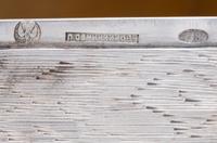 A Russian Trompe l'Oeil Silver Table-Top Cigarette Box
