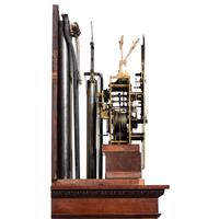 A Theodore B. Starr Mahogany Nine-Tube Tall-Case Case Clock