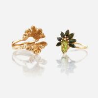 A peridot, green tourmaline, and gold ring