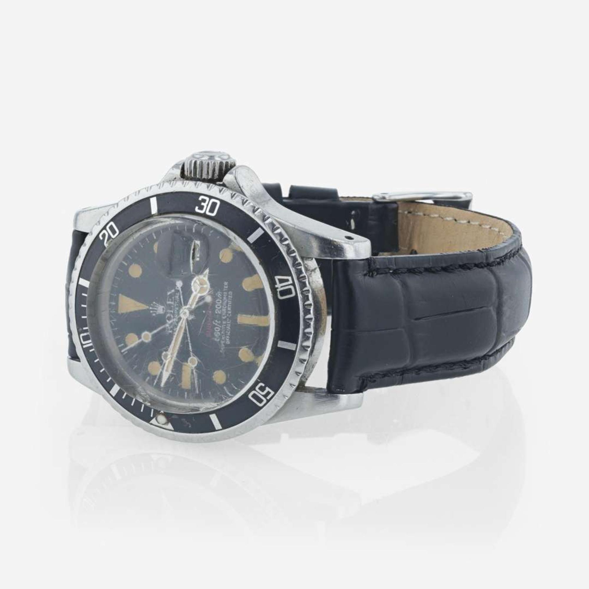 A stainless steel mens wristwatch, RED Rolex Submariner Ref. 1680 C.1974