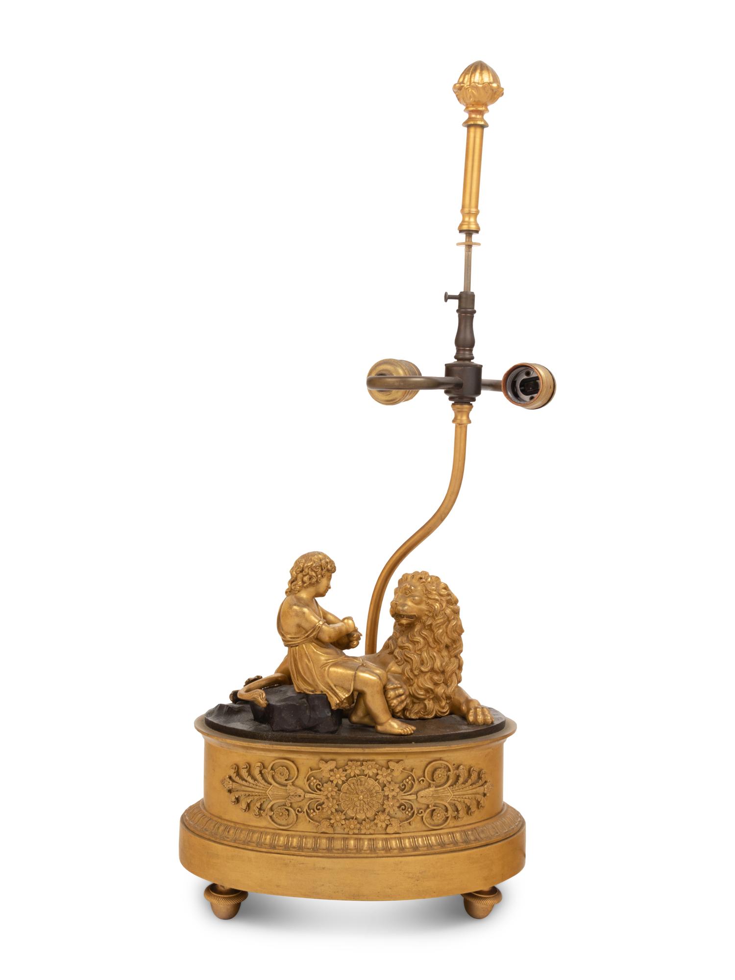 A Continental Gilt Bronze Figural Group Mounted as a Lamp