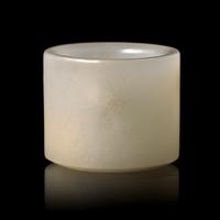 A Chinese Incised White Jade 'Poem' Archer's Ring, 18th/19th Century 清中晚期 白玉詩文扳指