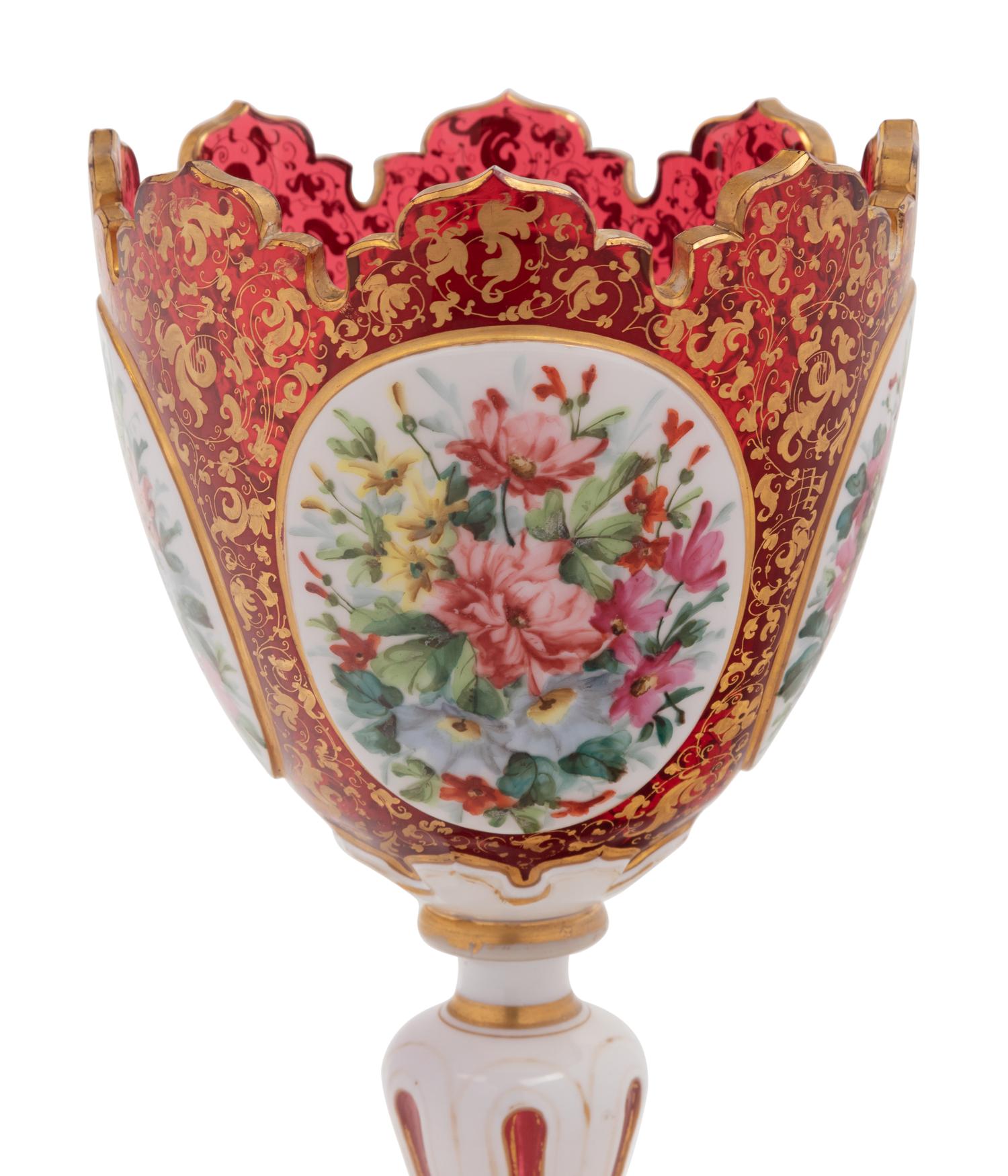A Bohemian Gilt and Enameled Ruby Glass Goblet