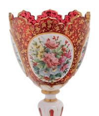 A Bohemian Gilt and Enameled Ruby Glass Goblet