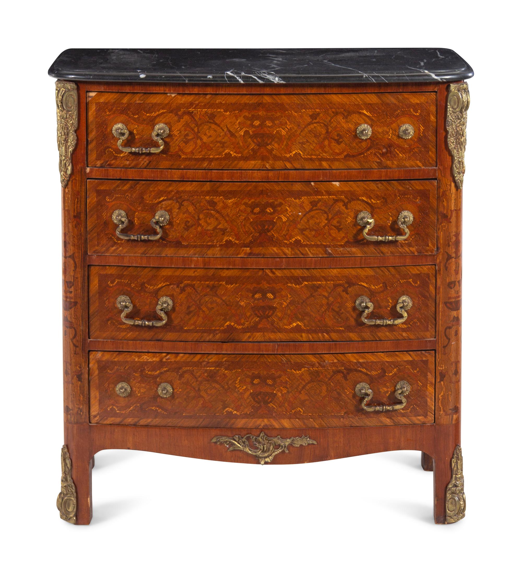 A Louis XV/XVI Transitional Style Gilt Bronze Mounted Marquetry Chest of Drawers