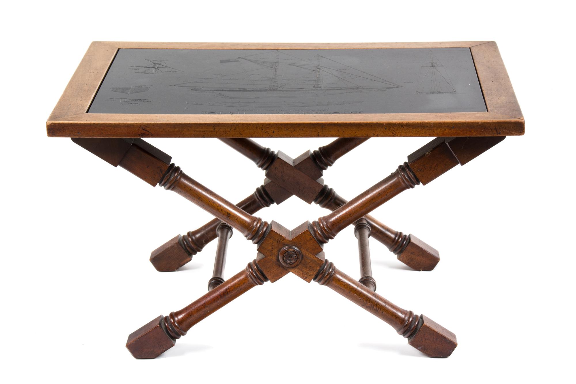 An American Etched Black Stone Top Mahogany Occasional Table Height 16 x width 28 x depth 20 inches. — 20TH CENTURY