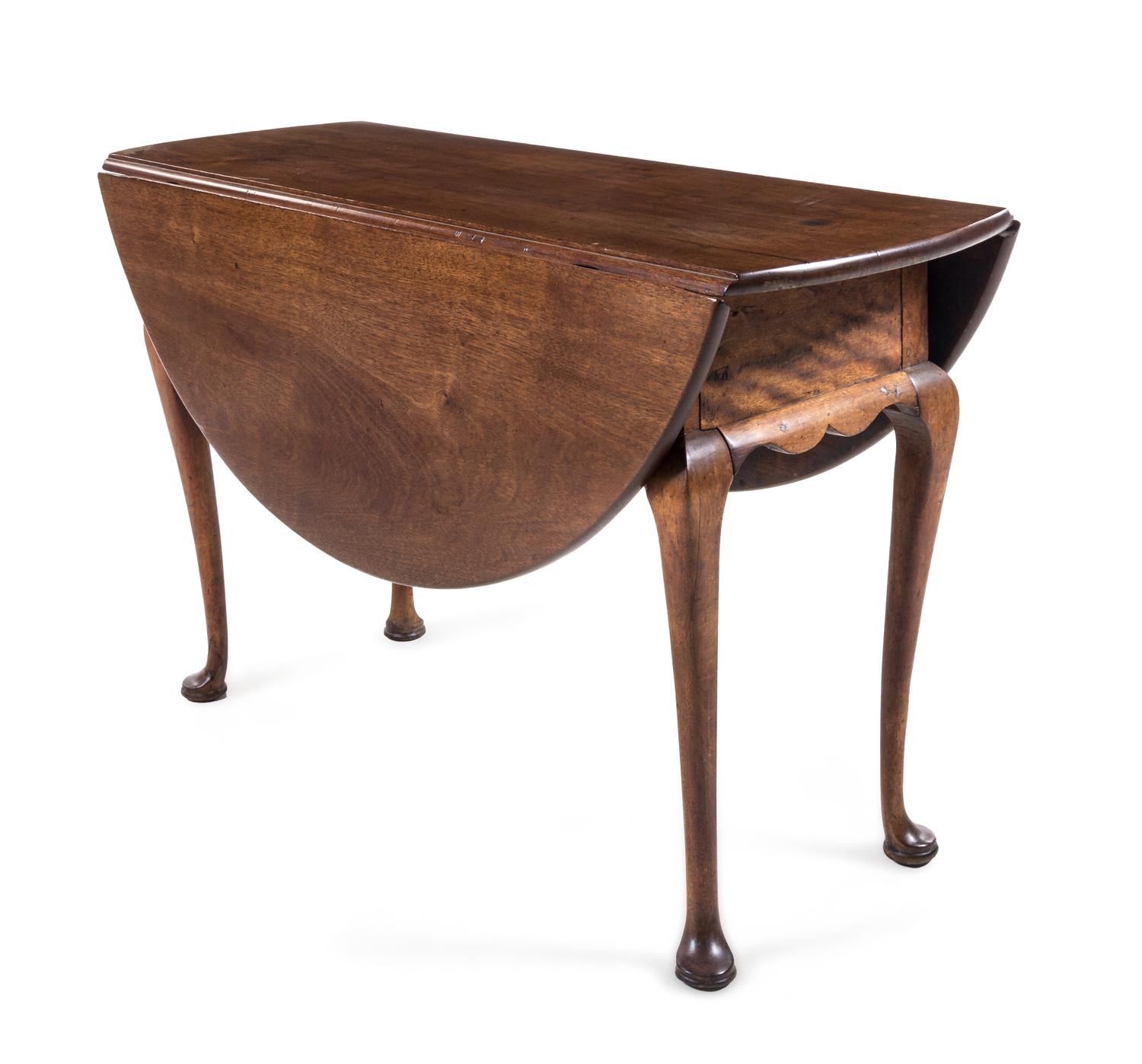 An American Queen Anne Walnut Drop-Leaf Table Height 29 x width 48 x depth 17 inches (closed). — FIRST HALF 18TH CENTURY