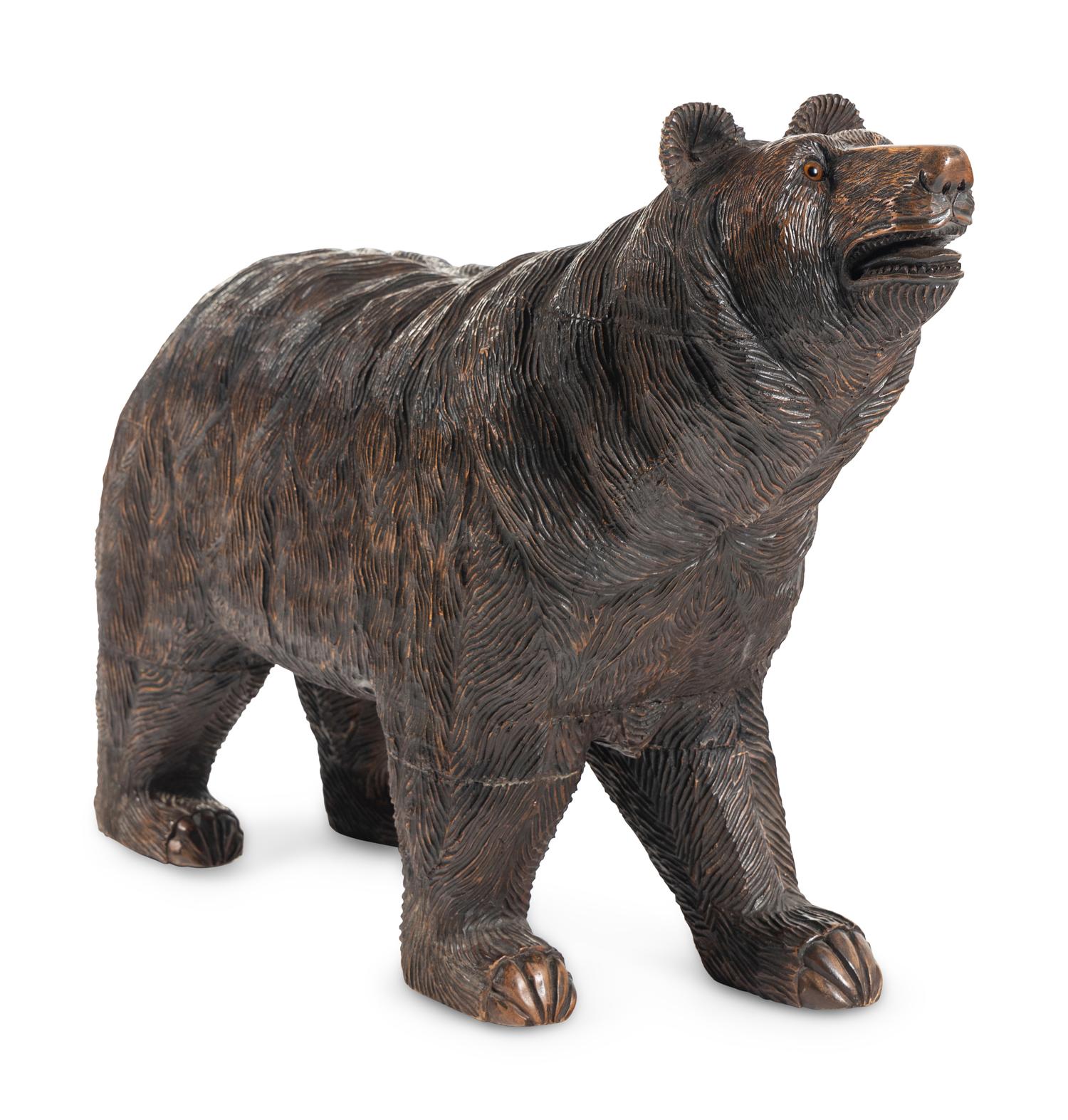 A Swiss Black Forest Carved Walnut Bear