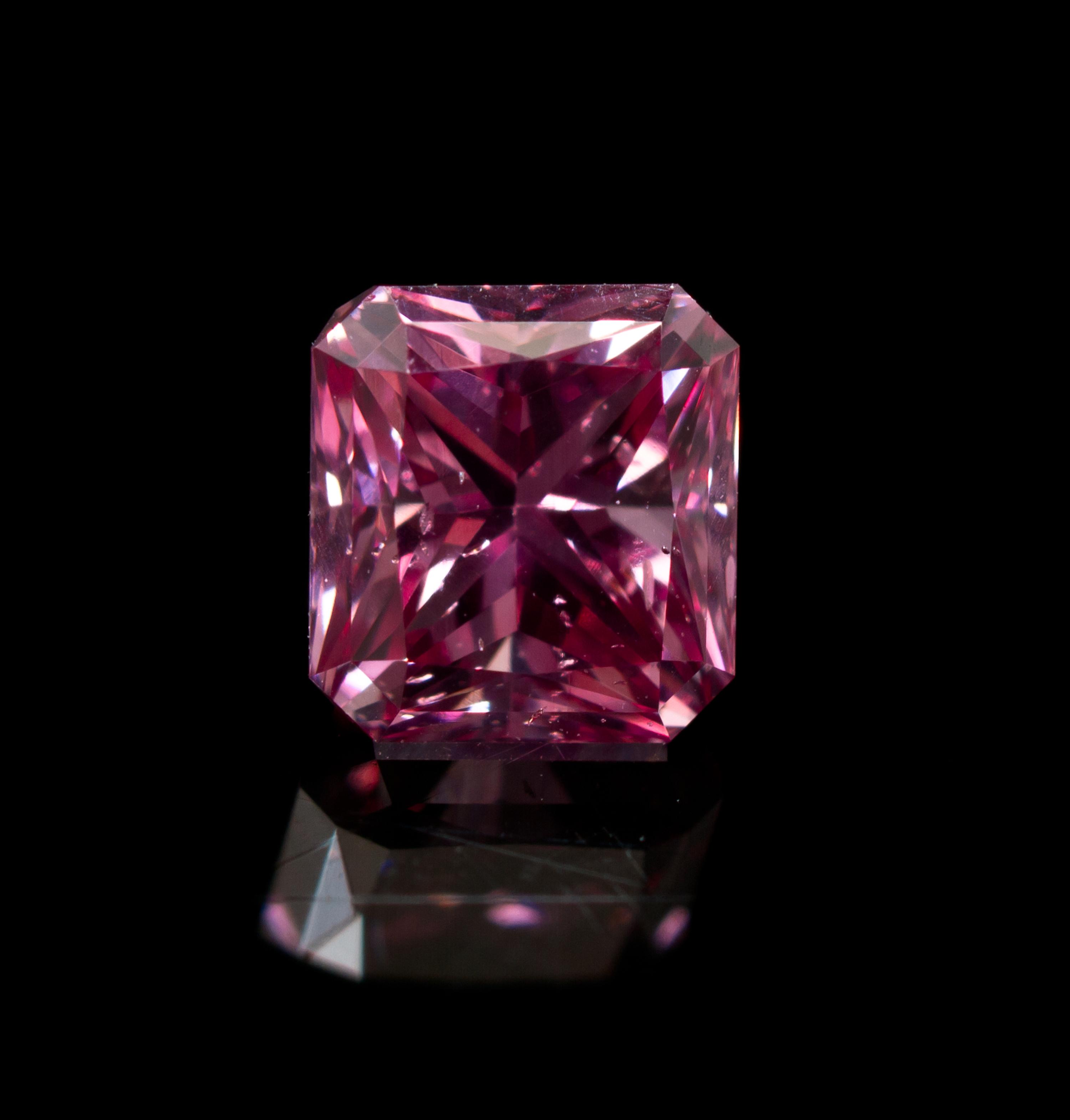 A 0.50 Carat Radiant Cut Fancy Intense Purplish Pink Diamond,