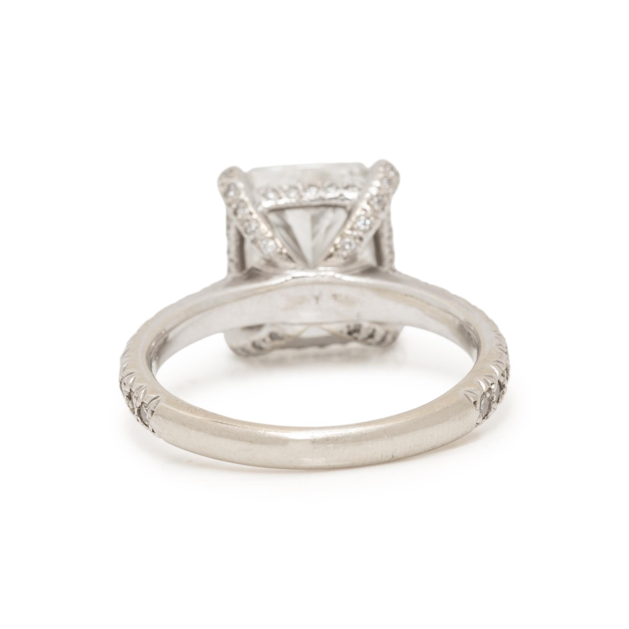 RADIANT CUT DIAMOND AND DIAMOND RING