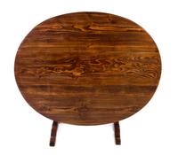 An American Oak Tilt-Top Breakfast Table Height 26 1/2 x width 50 1/4 x depth 40 1/4 inches. — 20TH CENTURY