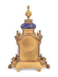 A French Porcelain Mounted Gilt Bronze Clock