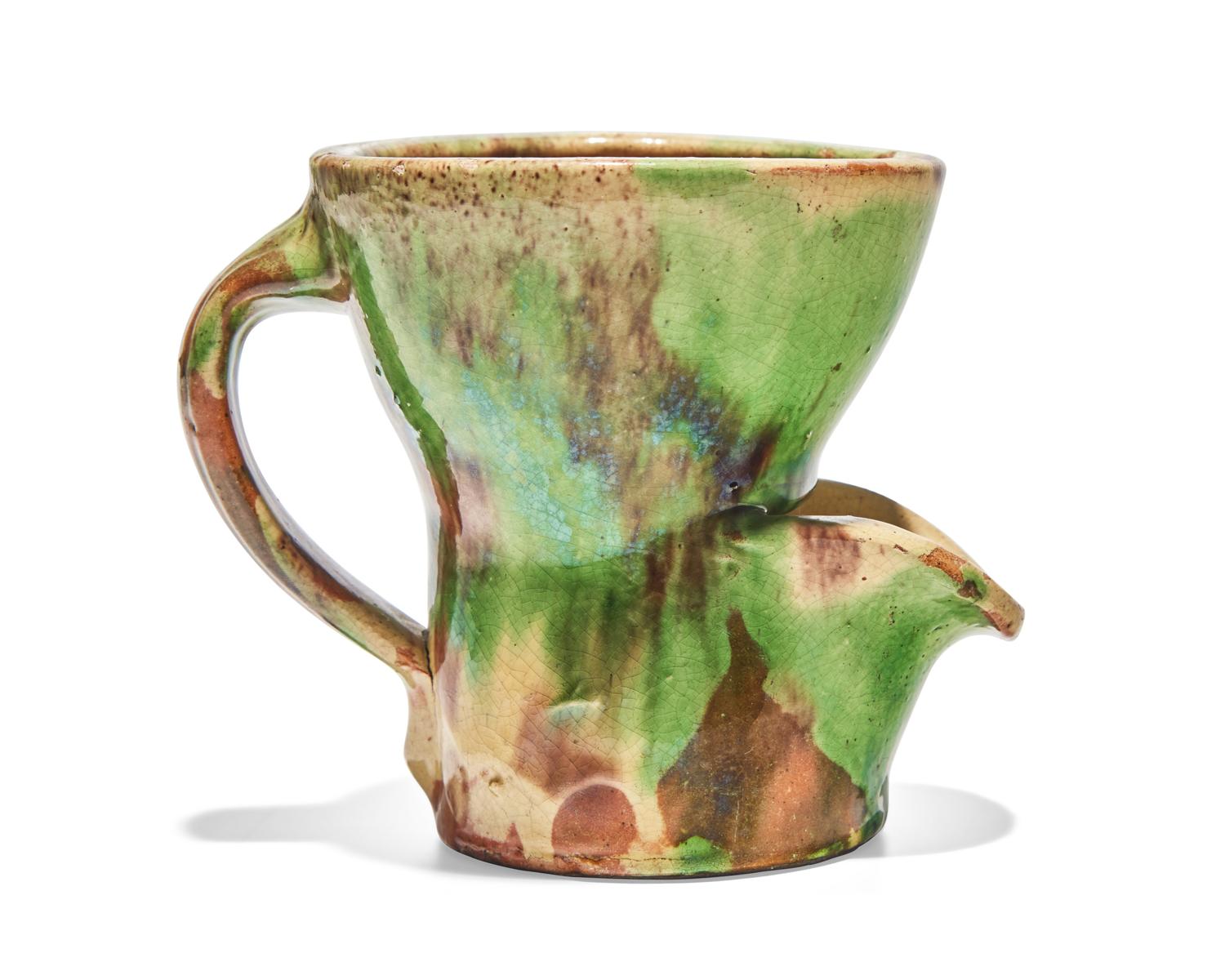 A Shenandoah Valley Multi-Glazed Redware Shaving Mug, Circa 1890