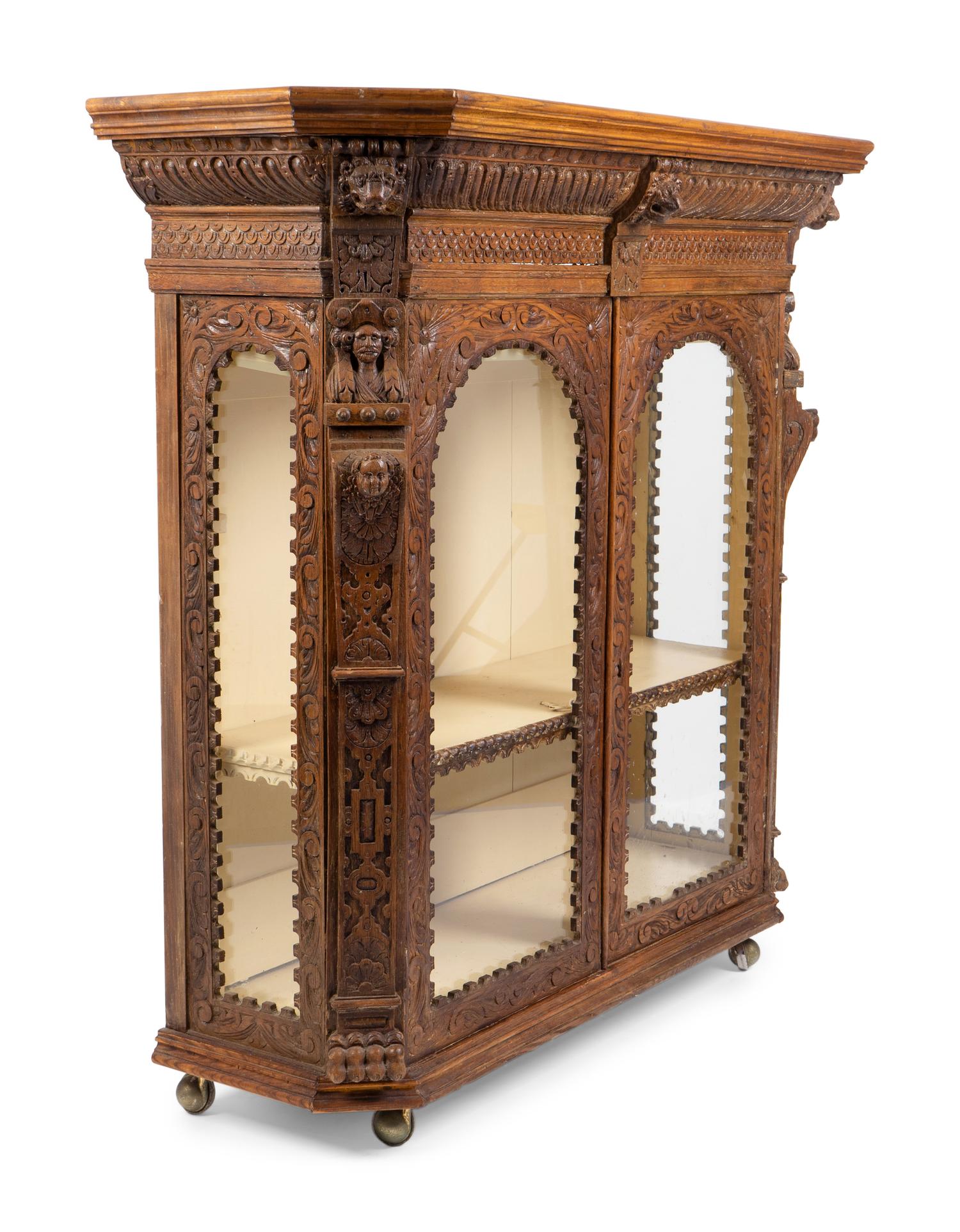 An Anglo-Indian Carved Wood Display Cabinet — 20TH CENTURY