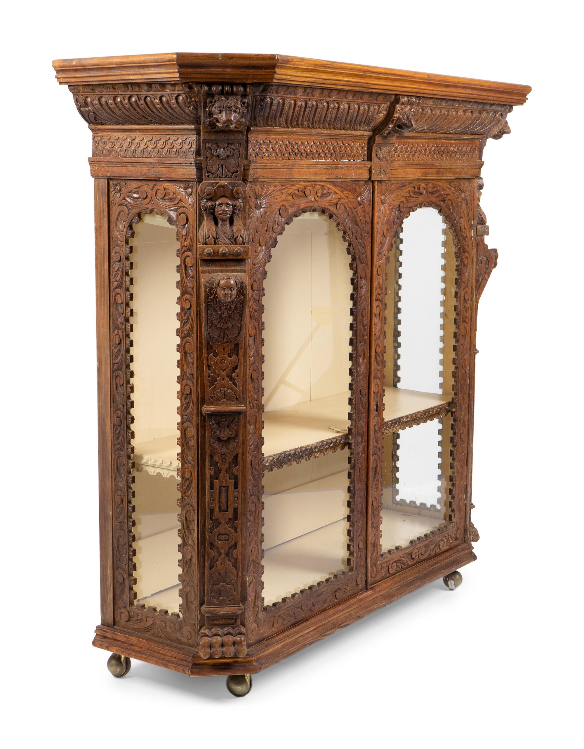 An Anglo-Indian Carved Wood Display Cabinet — 20TH CENTURY