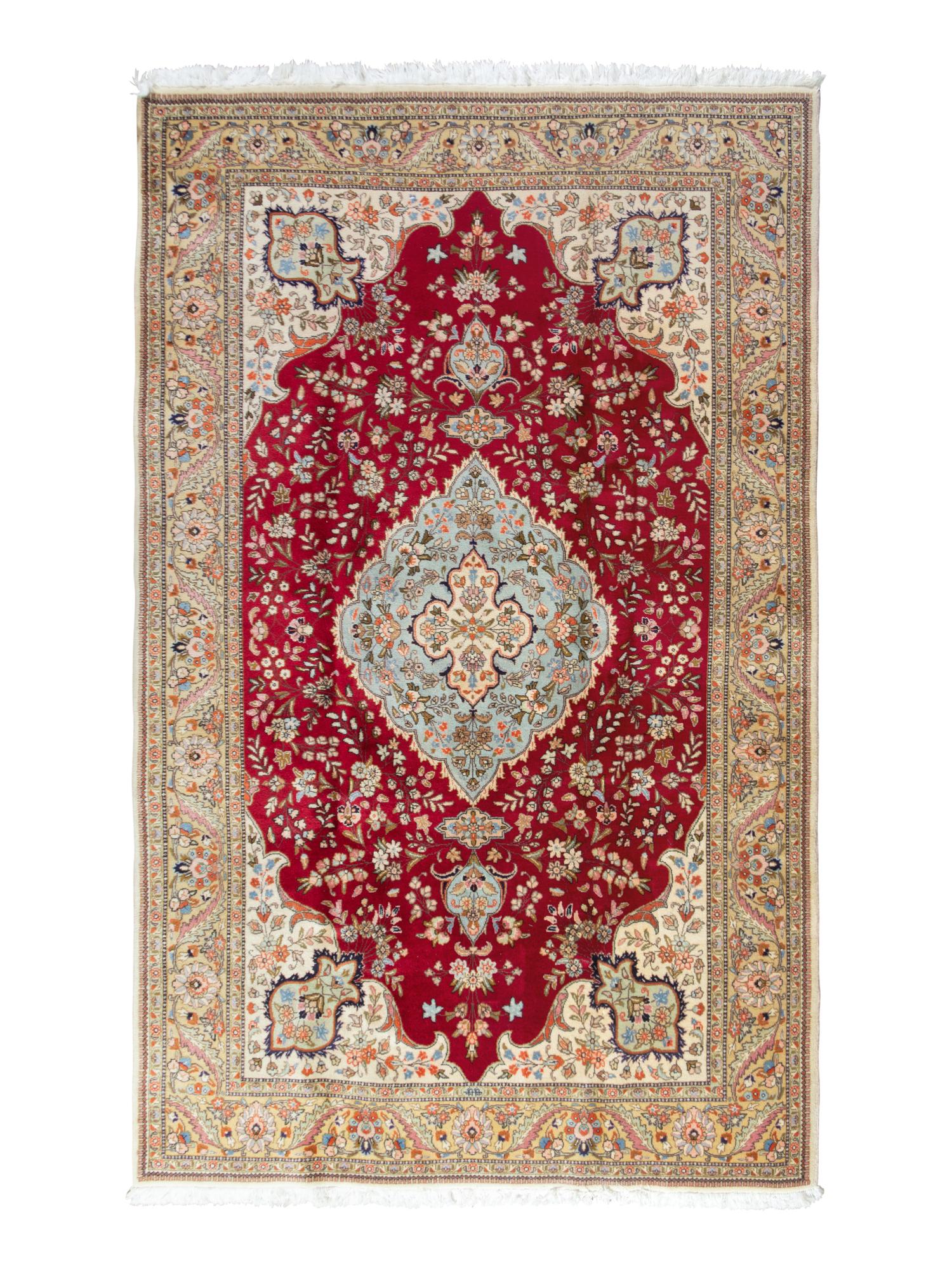 A Tabriz Wool Rug