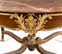 A Louis XV Style Gilt Bronze Mounted Parquetry Marble-Top Center Table