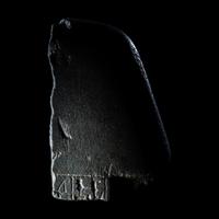 An Egyptian Schist Head of a Male