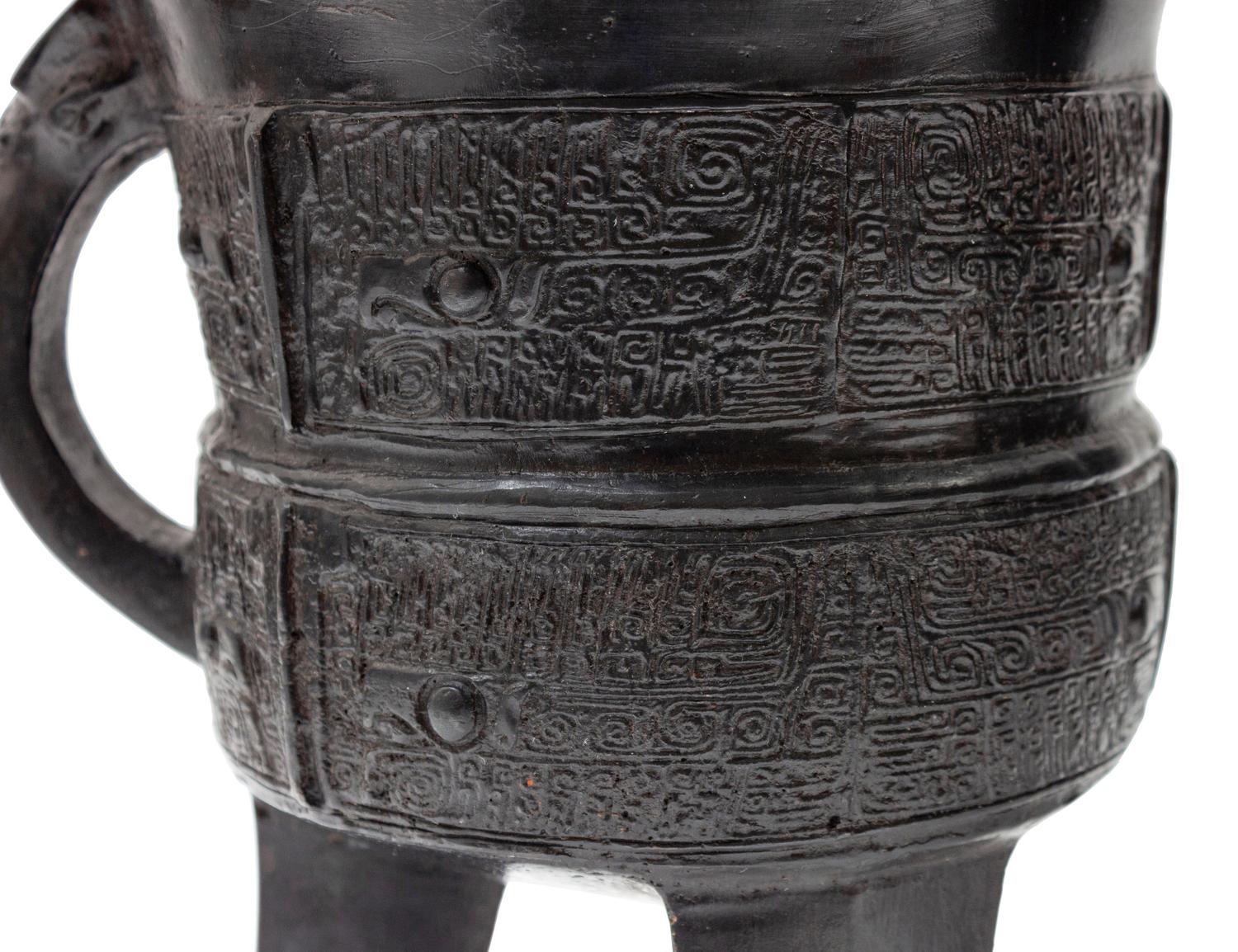 A Pair of Archaic Bronze Wine Vessels