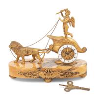 An Empire Gilt Bronze Figural Mantel Clock