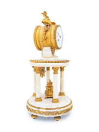 A French Gilt Bronze Mounted Marble Portico Clock