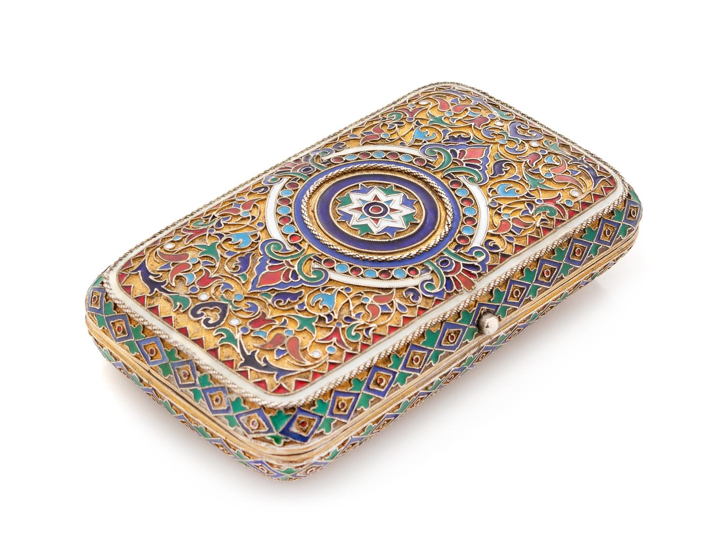 A Russian Silver-Gilt and Enamel Cigarette Case, Mark of Pavel Ovchinnikov with Imperial Warrant, Moscow 1875, one side of the case wit