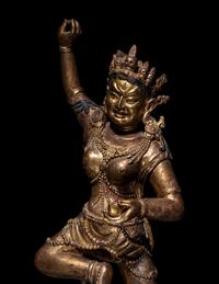 A Tibetan Gilt Lacquered Wood Figure of a Dancing Deity