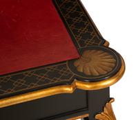 A Regency Style Black Lacquer and Parcel Gilt Card Table with Red Inset Leather Top