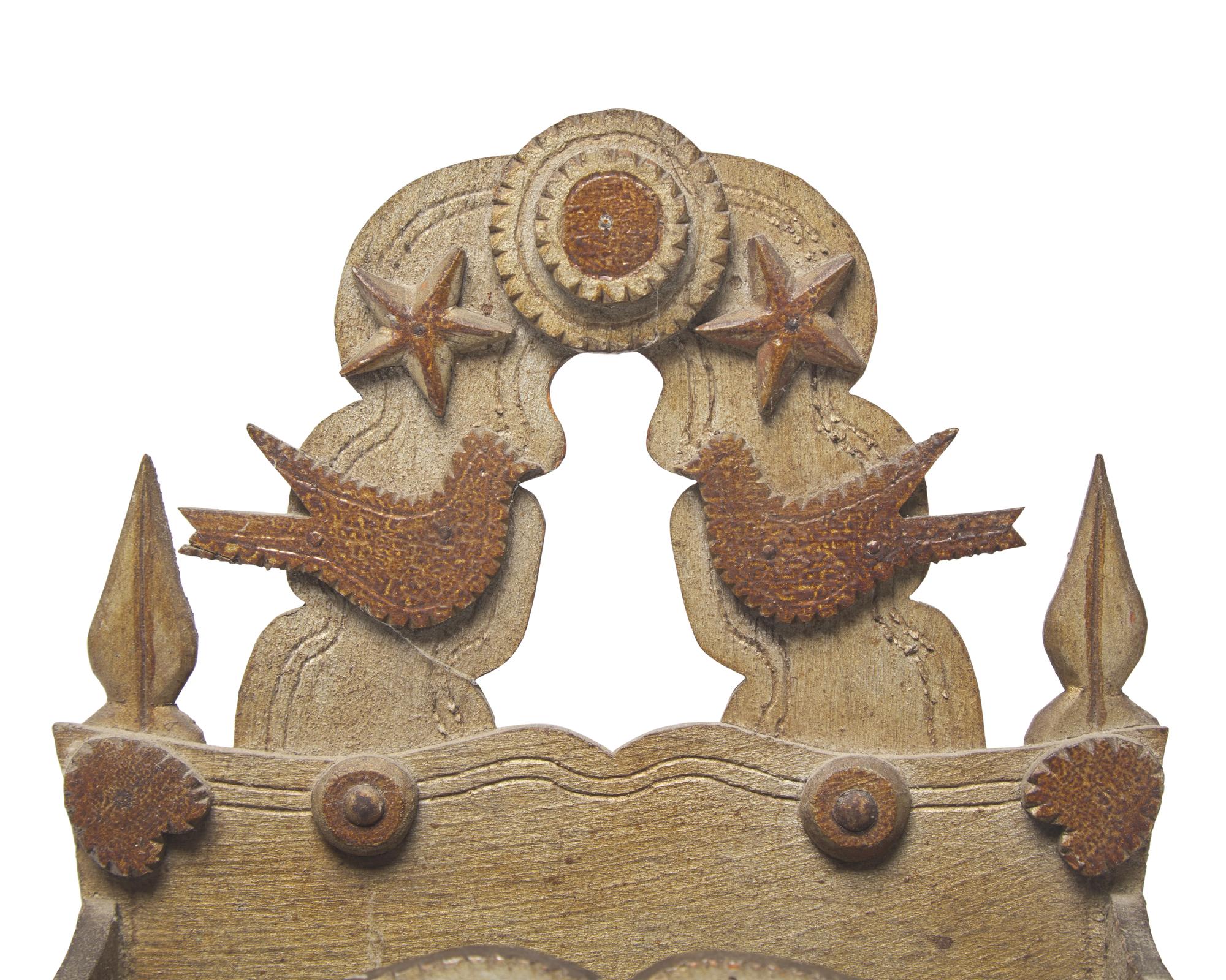 A Star, Fish, and Heart-Carved and Painted Wall Pocket