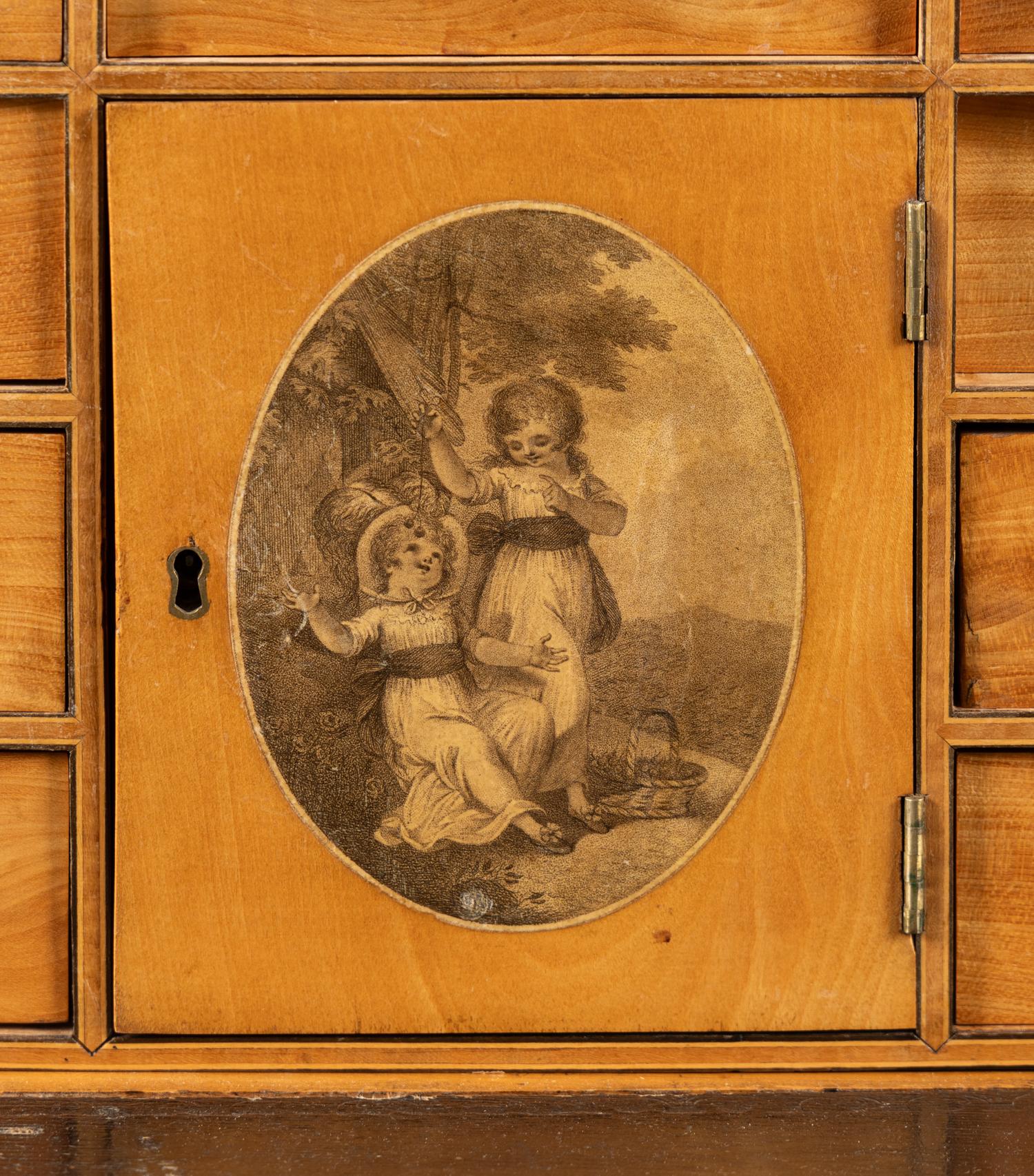 A George III Satinwood, Yew Wood and Marquetry Fall-Front Writing Cabinet on Stand