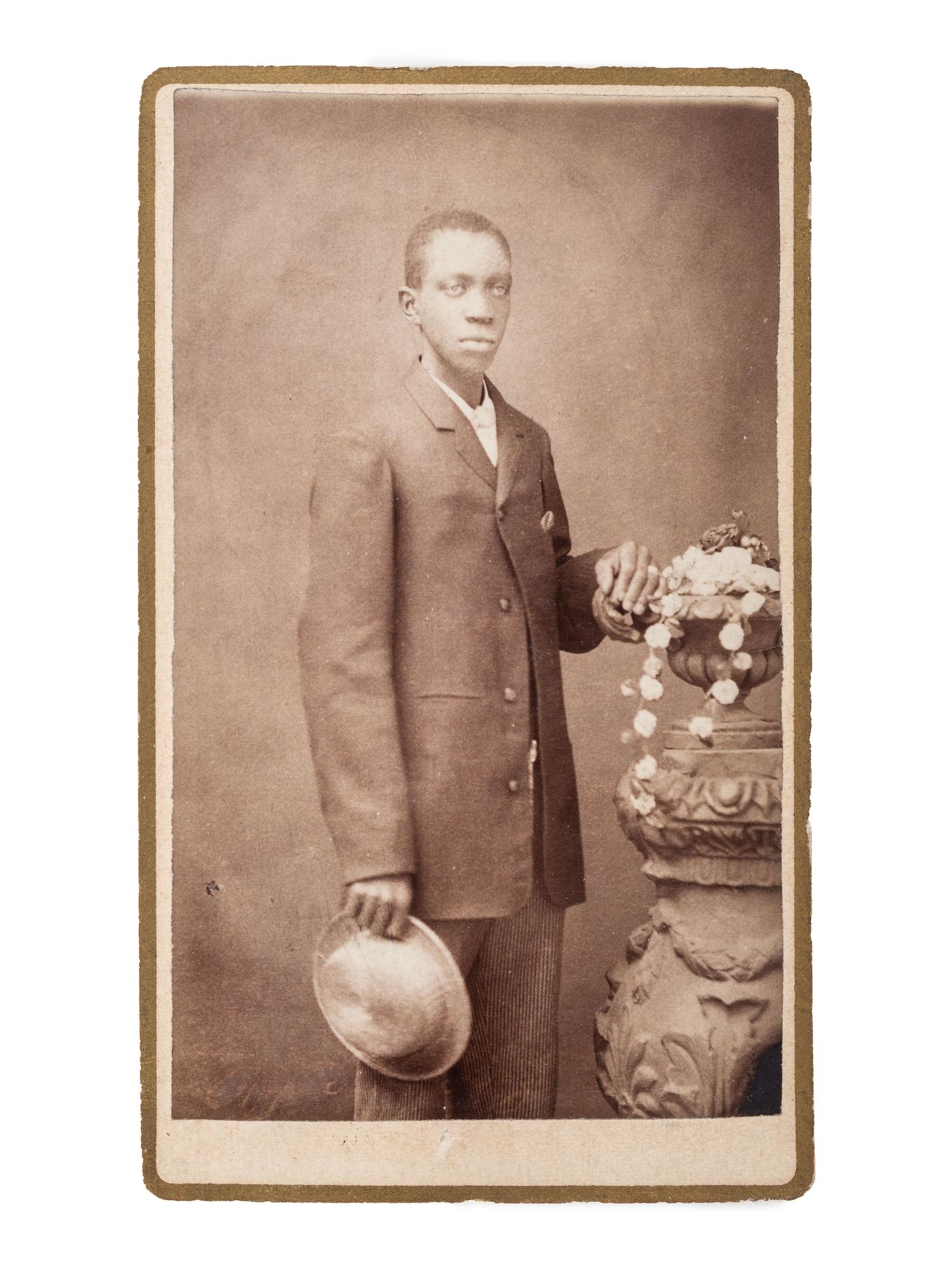 [EARLY PHOTOGRAPHY]. RICH, S.A., photographer. CDV of an African American gentleman. Zanesville, OH: n.d.