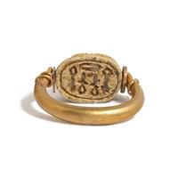 An Egyptian Gold and Steatite Scarab Swivel Ring
