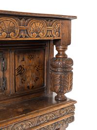 A Jacobean Style Oak and Marquetry Court Cupboard