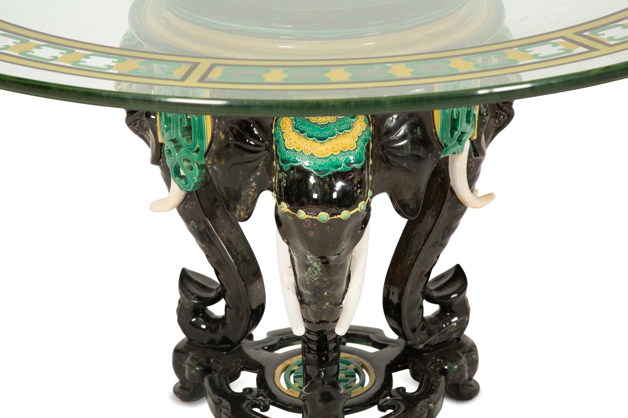 A Glazed Ceramic Elephant Base Table with Painted Glass Top — 20th Century