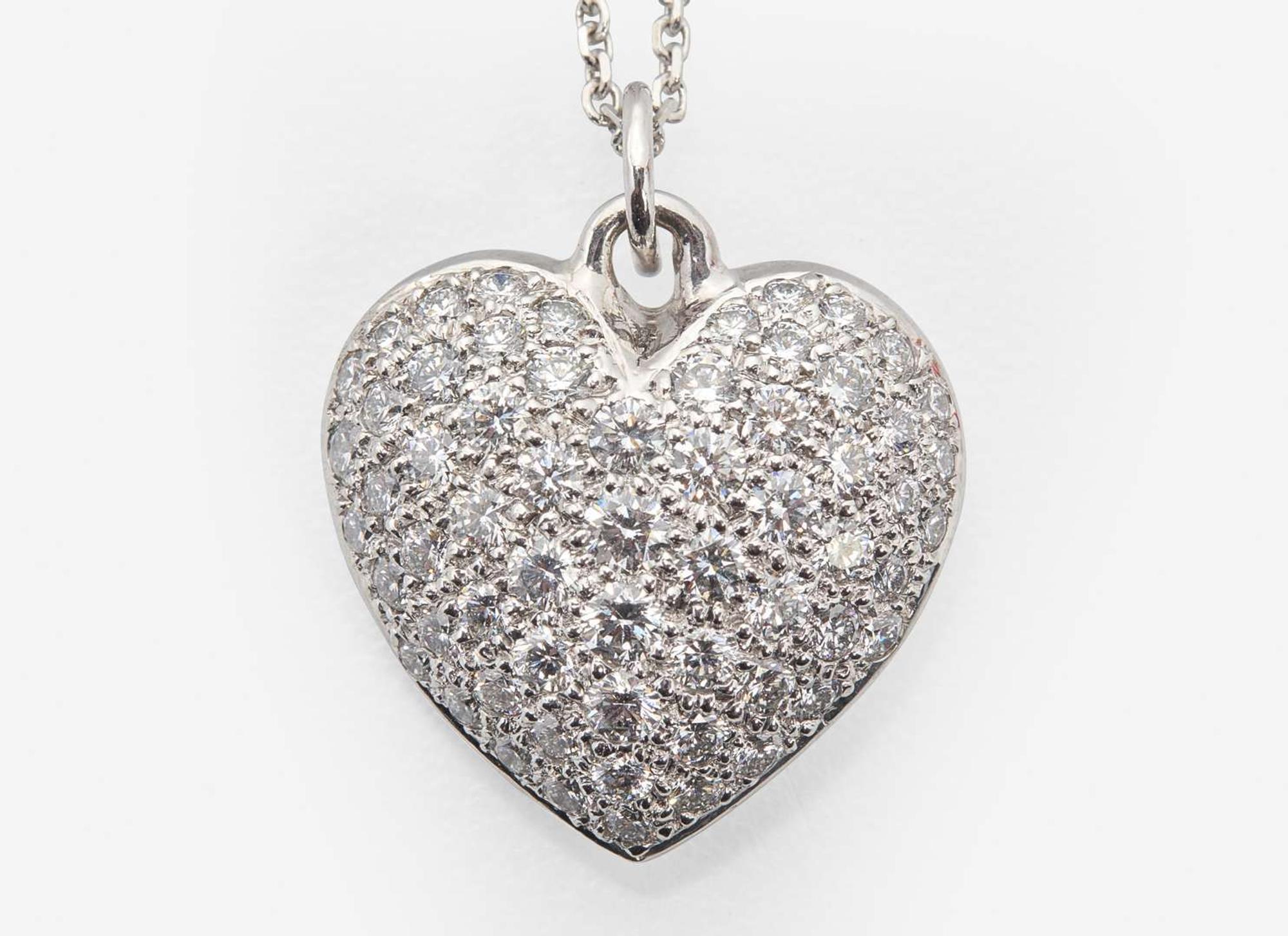 A 14K White Gold and Diamond Heart Necklace