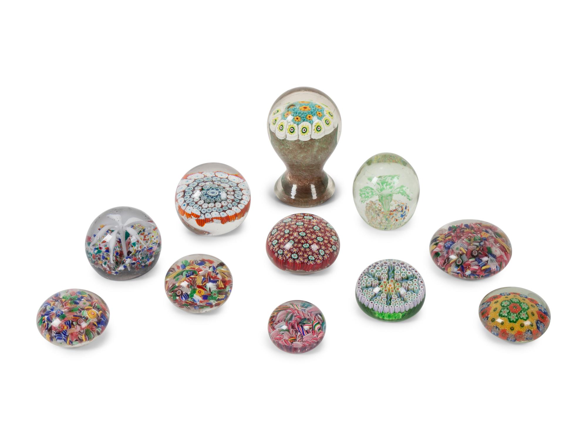 A Large Group of Caned and Blown Glass Paperweights