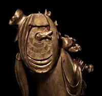 A Chinese Gilt Lacquered Wood Figure of Immortal