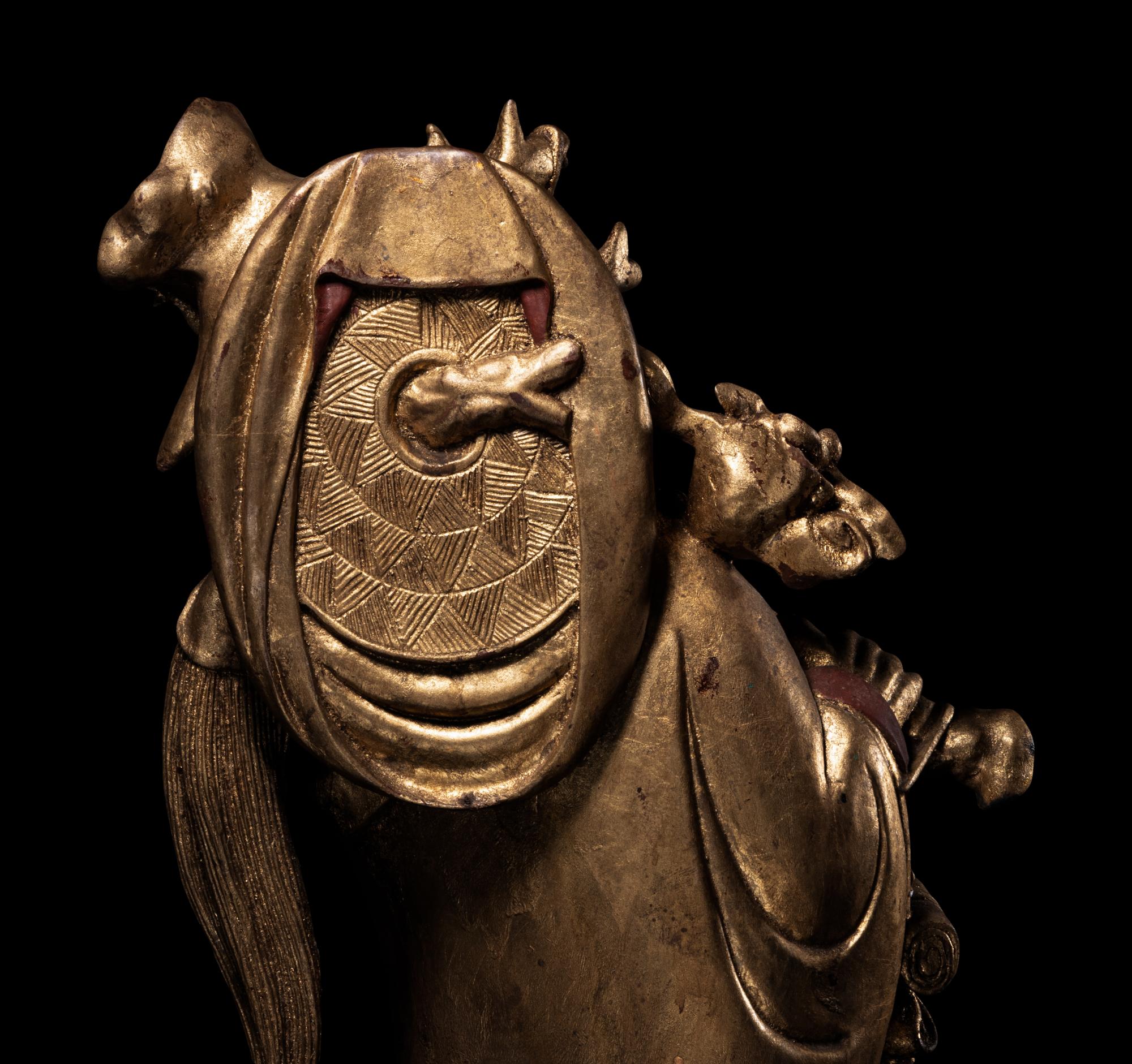 A Chinese Gilt Lacquered Wood Figure of Immortal