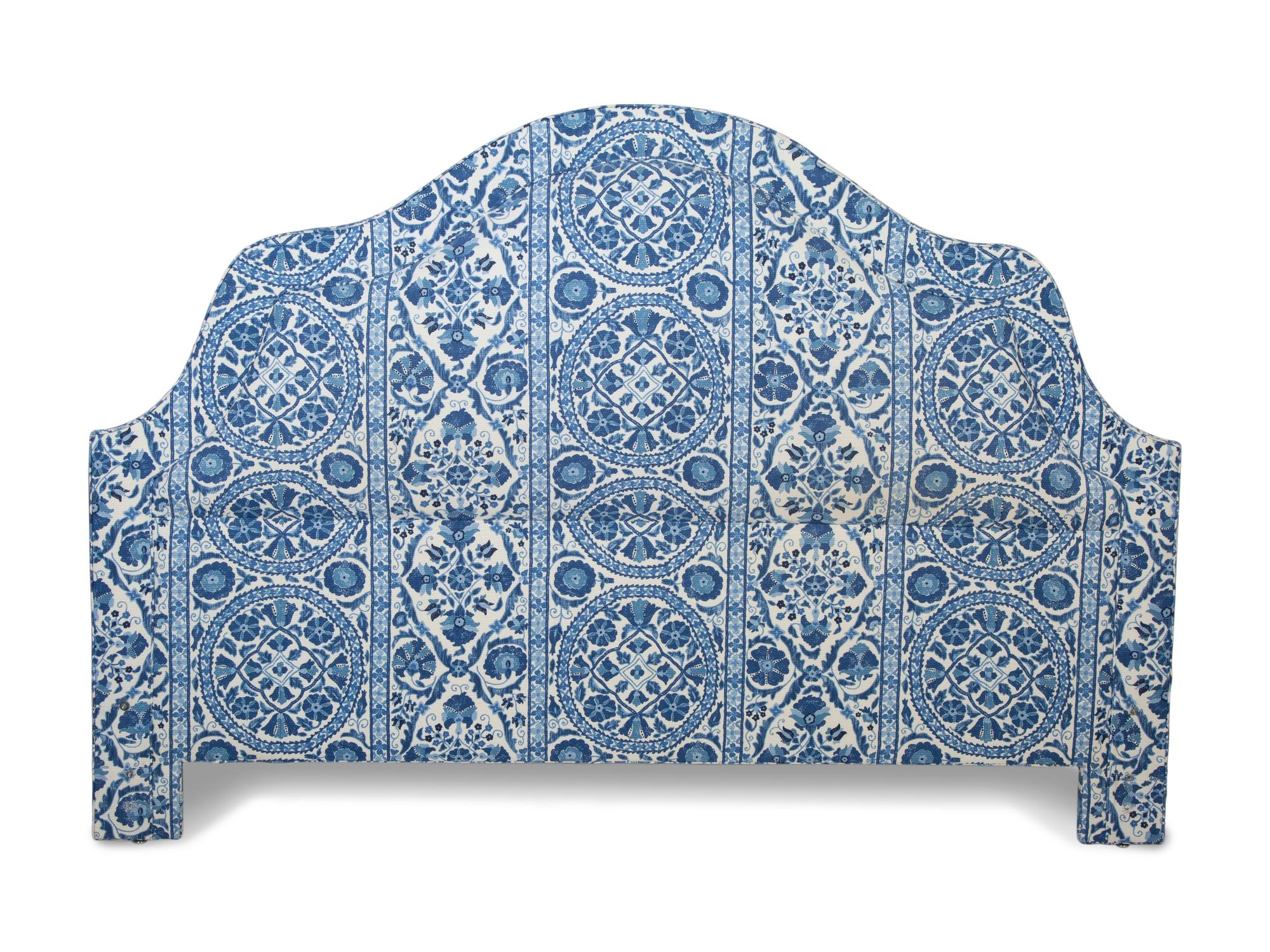 An Arched Upholstered Headboard — 20TH CENTURY
