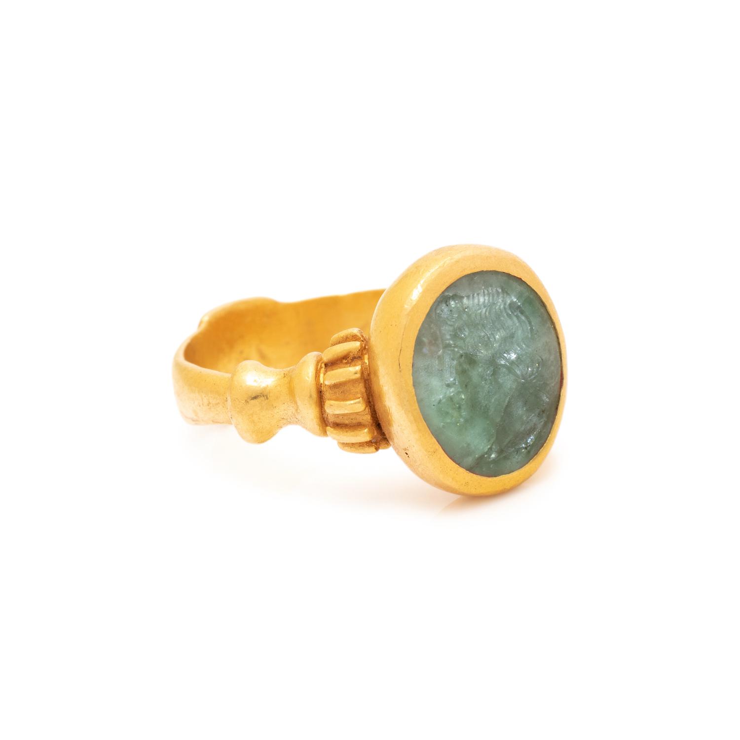 ANCIENT, HIGH KARAT YELLOW GOLD AND AQUAMARINE INTAGLIO RING
