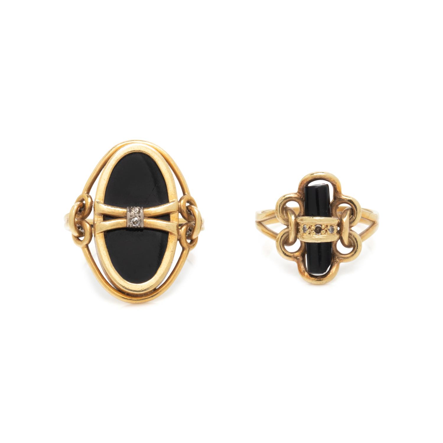 COLLECTION OF YELLOW GOLD AND BLACK ONYX RINGS