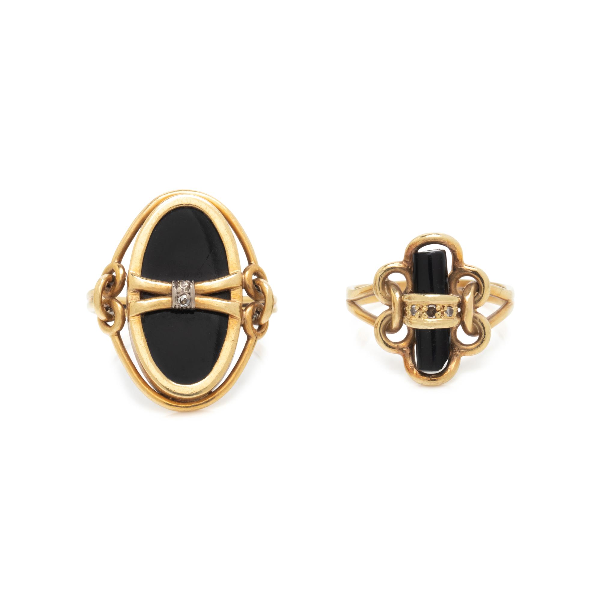 COLLECTION OF YELLOW GOLD AND BLACK ONYX RINGS