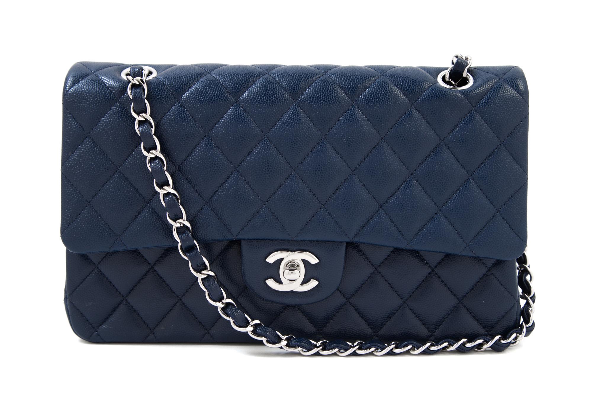A Chanel Navy Caviar Classic Double Flap Handbag, 10" x 6" x 2.5"; Strap Drop: 9.5".
