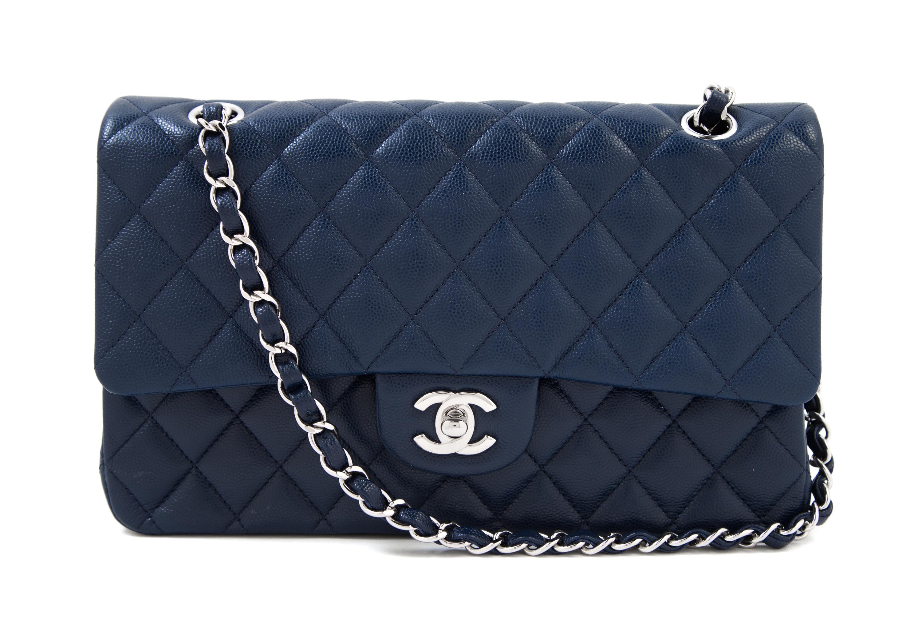 A Chanel Navy Caviar Classic Double Flap Handbag, 10" x 6" x 2.5"; Strap Drop: 9.5".