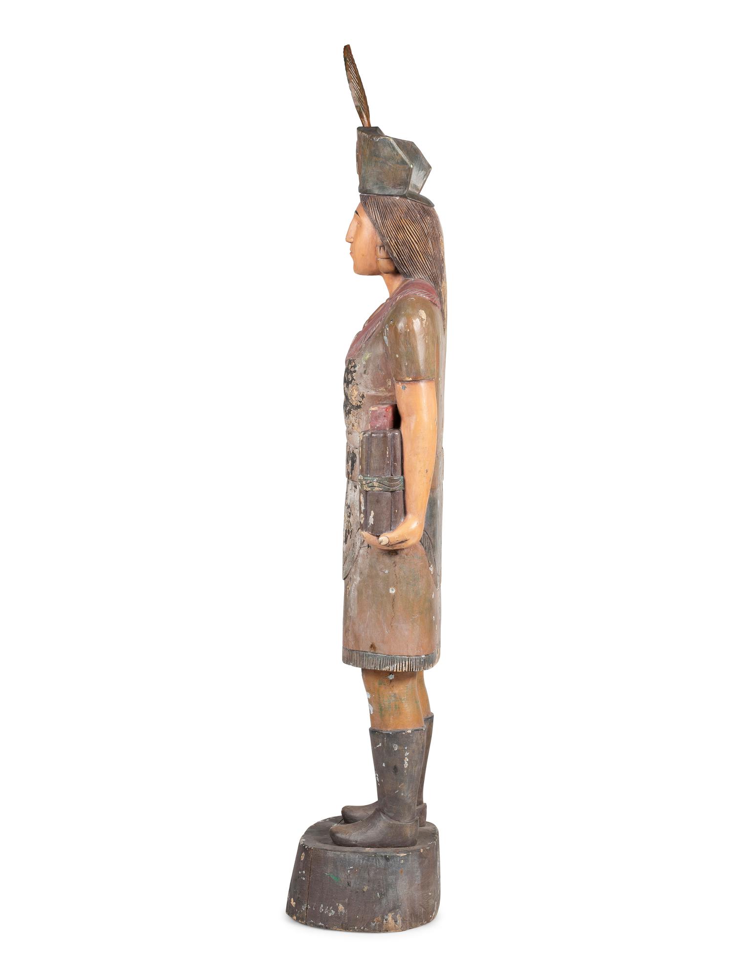 A Folk Art Carved and Painted Pine Native American Cigar Store Figure