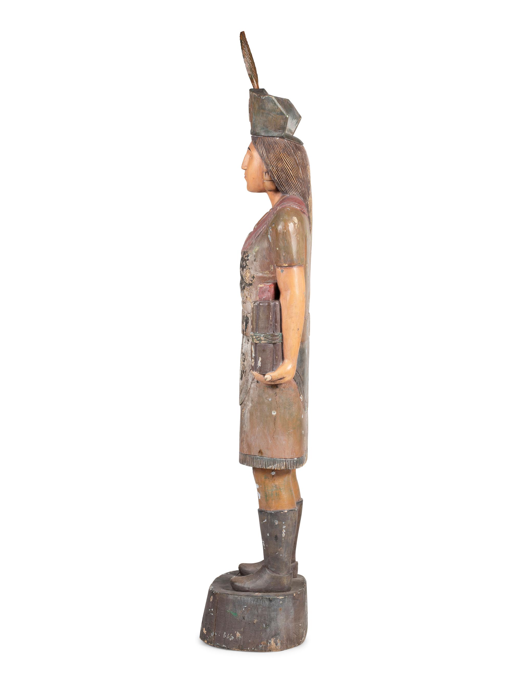 A Folk Art Carved and Painted Pine Native American Cigar Store Figure