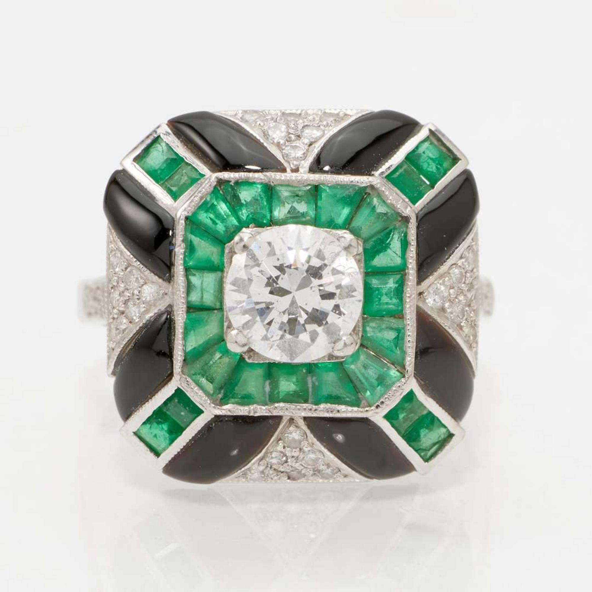 A Platinum, Diamond, and Gemstone Ring