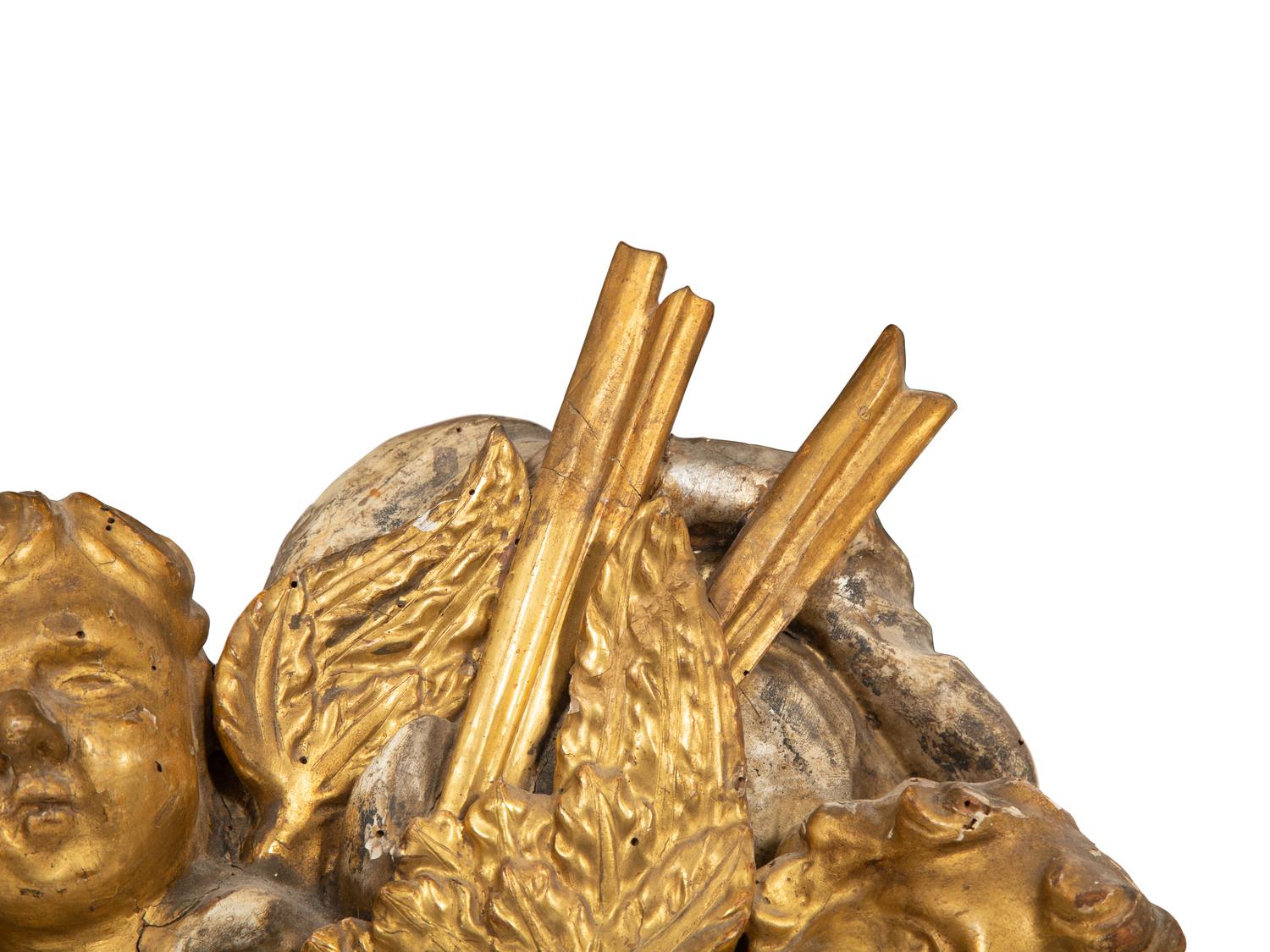 An Italian Carved Giltwood and Silvered Wall Mount